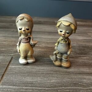 Vintage Japanese Bisque Ceramic Figurines Boy Girl Holding Ducks Collectible